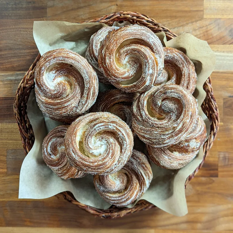 A basket of sugar-dusted morning buns